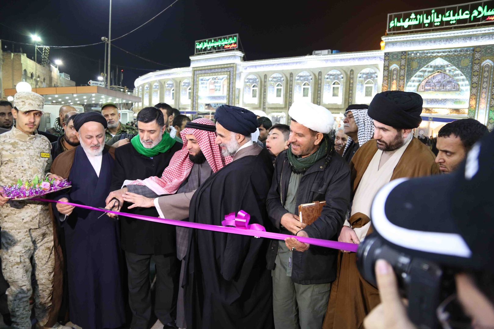 جانب من افتتاح معرض المؤتمر الخاص بمقتنيات الحشد الشعبي في منطقة ما بين الحرمين الشريفين